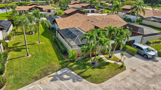 bird's eye view with a water view and a residential view