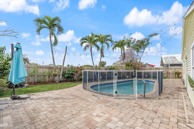 view of pool with a patio area