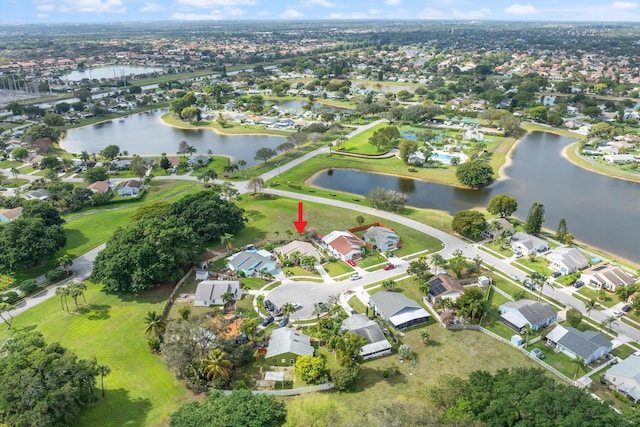 drone / aerial view featuring a water view