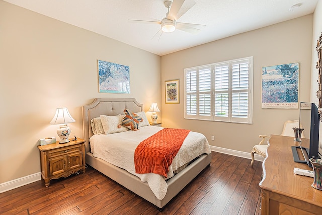 bedroom with dark wood-type flooring and ceiling fan