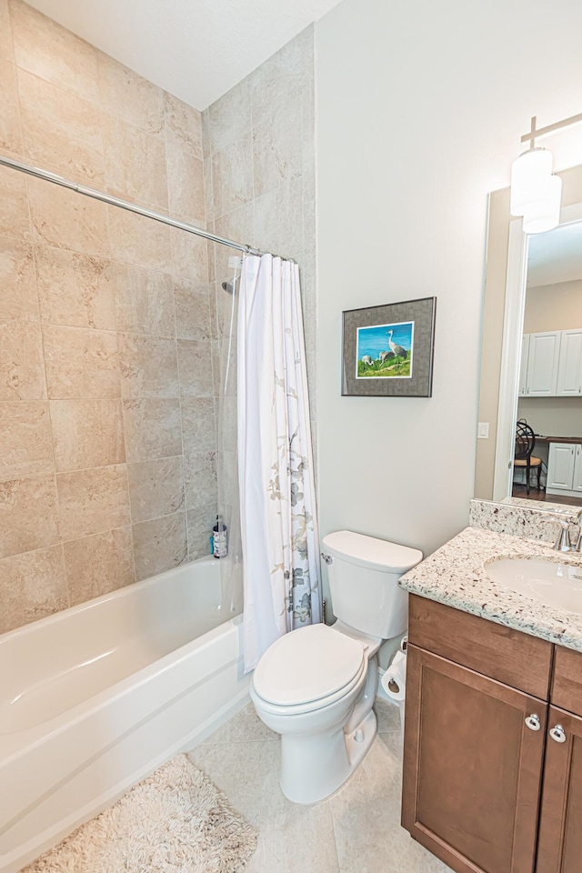 full bathroom with vanity, shower / tub combo with curtain, tile patterned floors, and toilet