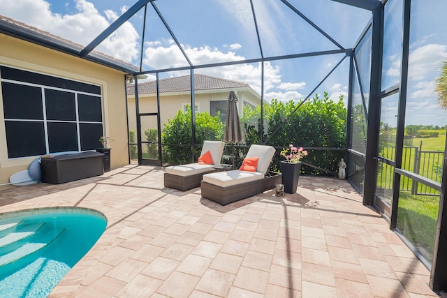 view of patio / terrace with glass enclosure