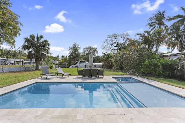 4448 SW 34th Ter, Dania Beach, FL 33312 - swimming pool featuring a patio area