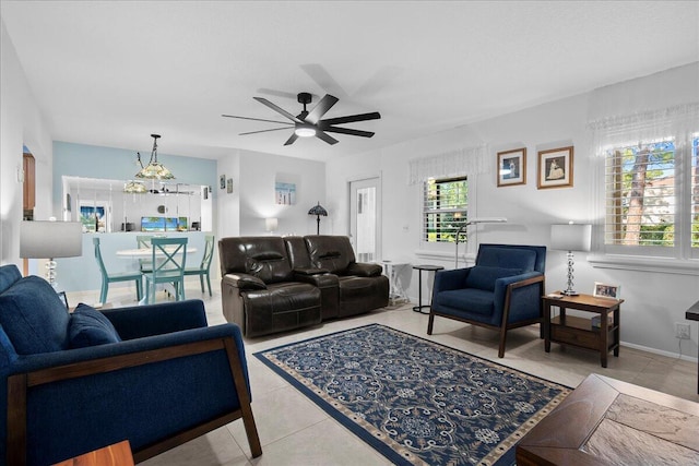 living room with light tile patterned flooring and ceiling fan