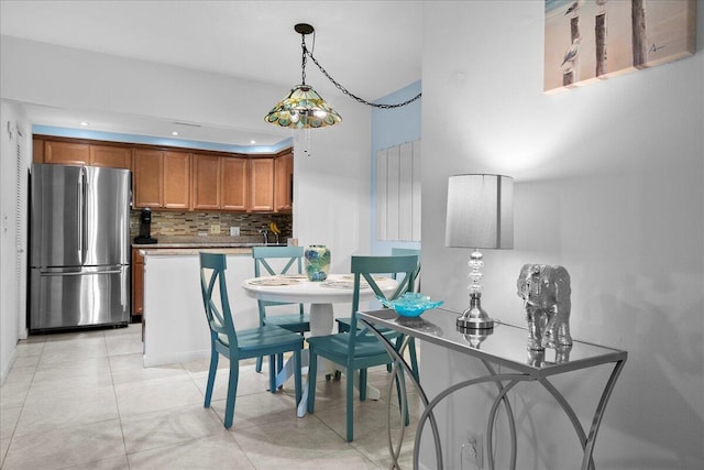 dining room featuring light tile patterned floors