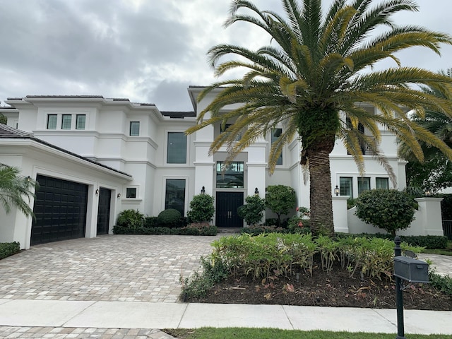 view of front of property with a garage