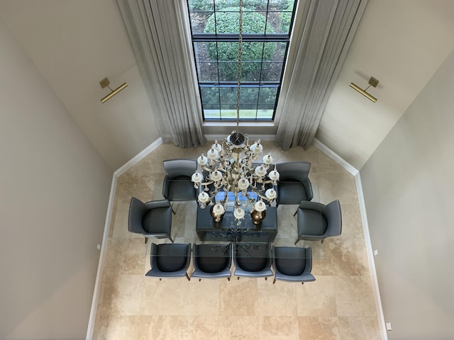 living room with a notable chandelier