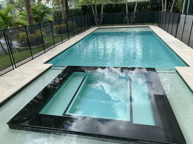2704 NW 75th St, Boca Raton, FL 33496 - view of swimming pool featuring a pool with connected hot tub
