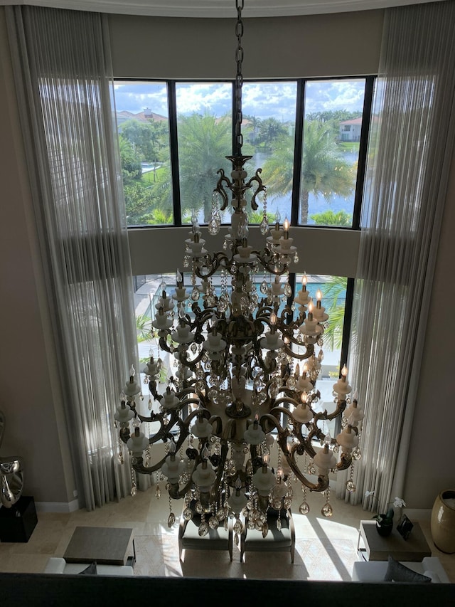 room details with a water view and a chandelier