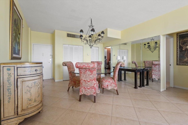 3450 S Ocean Blvd Unit 812, Palm Beach, FL 33480 - dining space featuring visible vents, baseboards, an inviting chandelier, and light tile patterned flooring