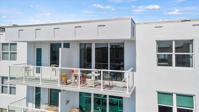 3450 S Ocean Blvd Unit 812, Palm Beach, FL 33480 - back of house with stucco siding