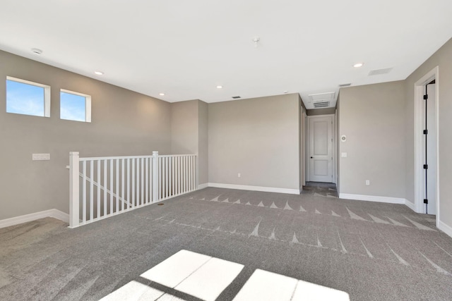 unfurnished room featuring carpet flooring