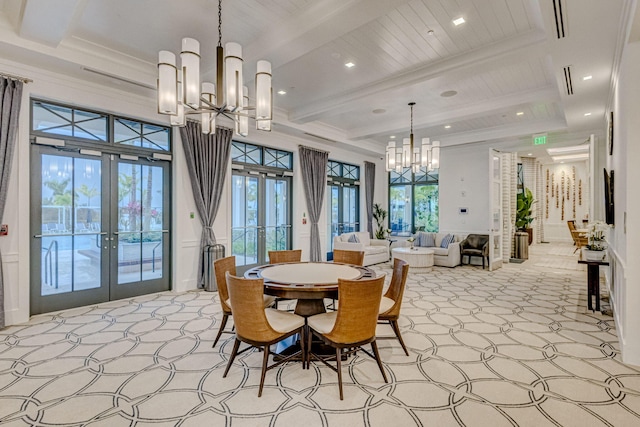 dining space with crown molding, a chandelier, coffered ceiling, french doors, and beamed ceiling