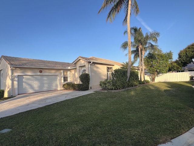 single story home with a garage and a front yard