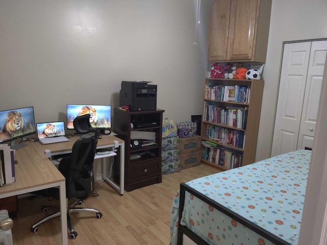 bedroom featuring light wood-type flooring