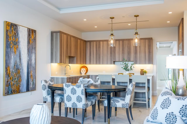 dining area featuring sink