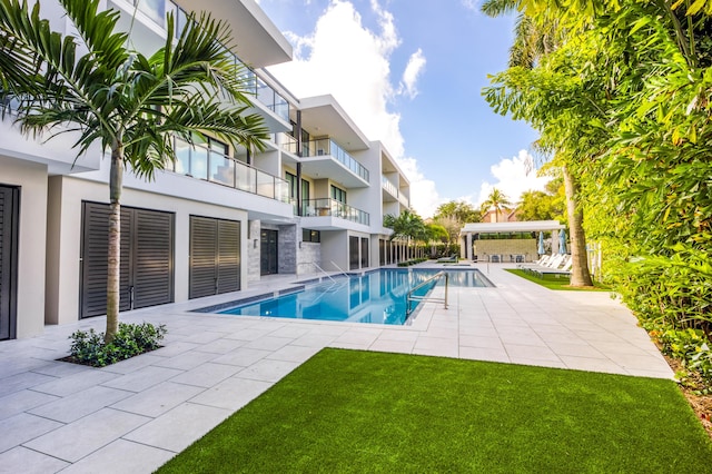 view of pool featuring a patio area