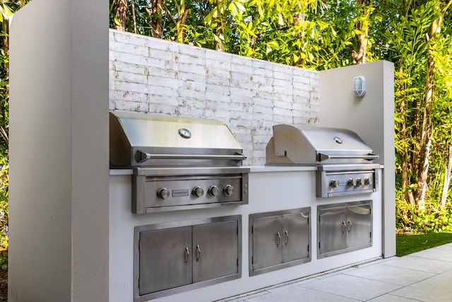 view of patio / terrace featuring an outdoor kitchen and grilling area