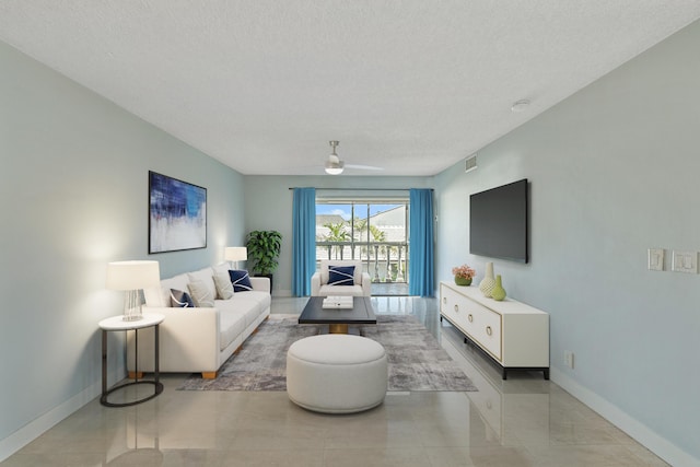 148 Yacht Club Dr Unit 12, North Palm Beach, FL 33408 - living area with a textured ceiling and a ceiling fan