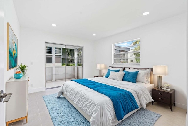 bedroom featuring access to outside and light tile patterned floors