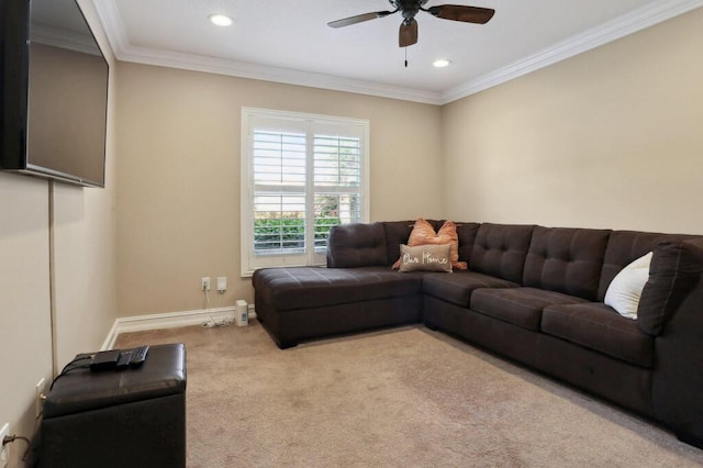 carpeted living room featuring crown molding and ceiling fan