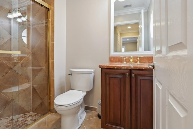 bathroom featuring tile patterned floors, ornamental molding, toilet, and walk in shower