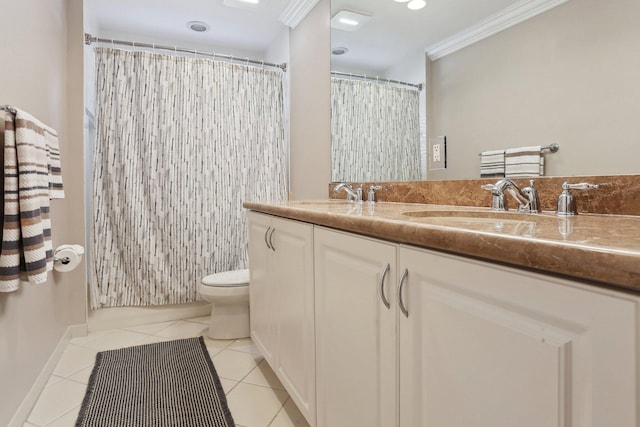 bathroom with tile patterned flooring, crown molding, vanity, and toilet