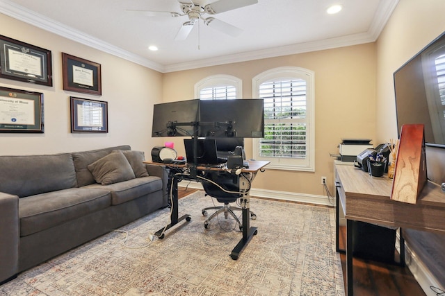 home office featuring hardwood / wood-style flooring, crown molding, and ceiling fan