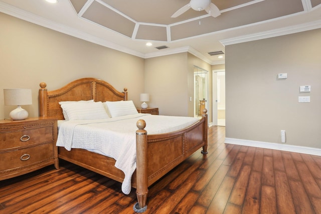 bedroom featuring crown molding, dark wood-type flooring, ceiling fan, and ensuite bath