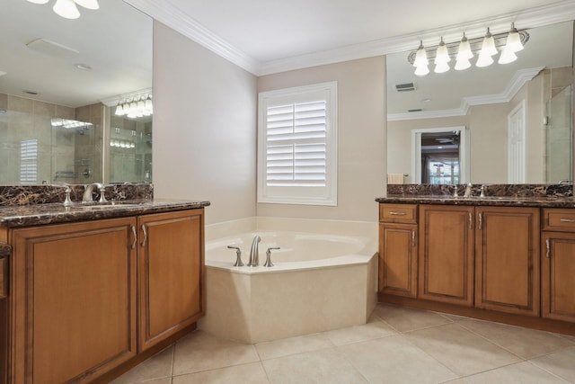 bathroom with tile patterned flooring, plus walk in shower, vanity, and crown molding