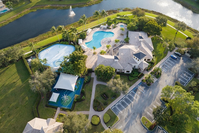 birds eye view of property featuring a water view