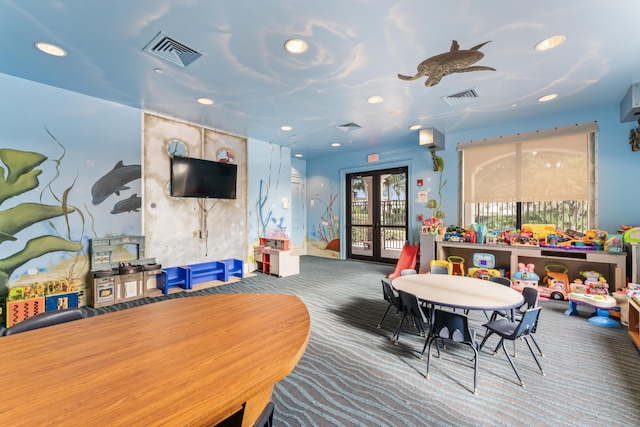 rec room with french doors and carpet flooring