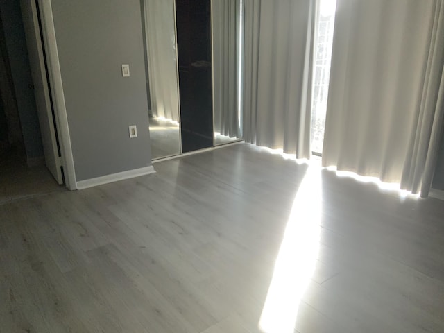 unfurnished bedroom featuring light hardwood / wood-style flooring