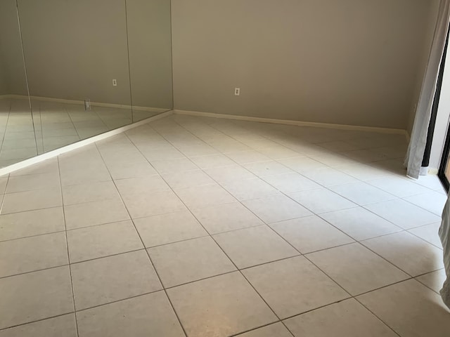 unfurnished bedroom featuring light tile patterned floors