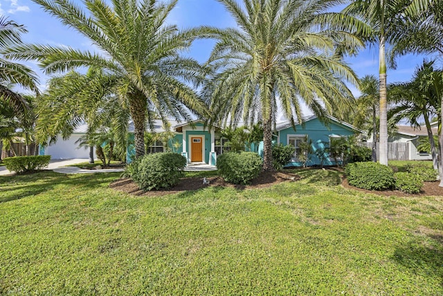 view of front of home with a front lawn