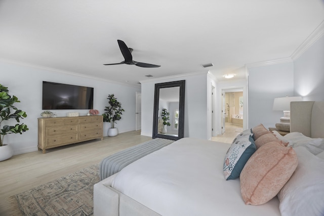 bedroom with crown molding, ensuite bathroom, ceiling fan, and light hardwood / wood-style flooring