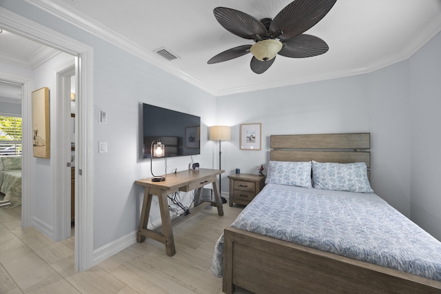 bedroom with crown molding and ceiling fan