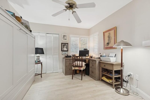 home office featuring ceiling fan and light wood-type flooring