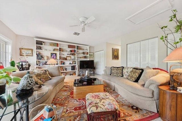 living room with ceiling fan