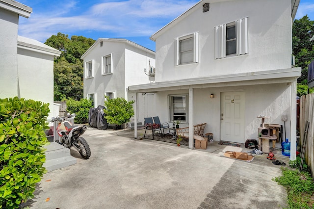 view of front of house with a patio area