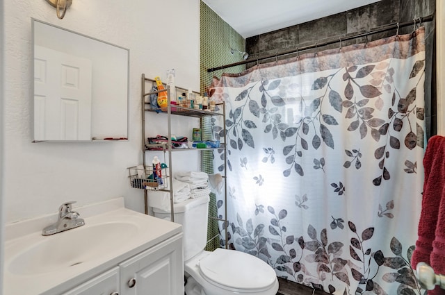 bathroom with a shower with curtain, vanity, and toilet