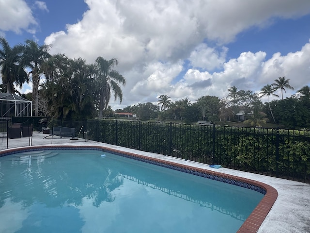 view of swimming pool with a patio area