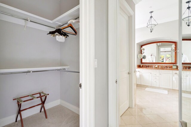 bathroom featuring tile patterned floors and vanity