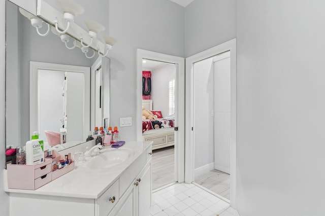 bathroom featuring tile patterned floors and vanity