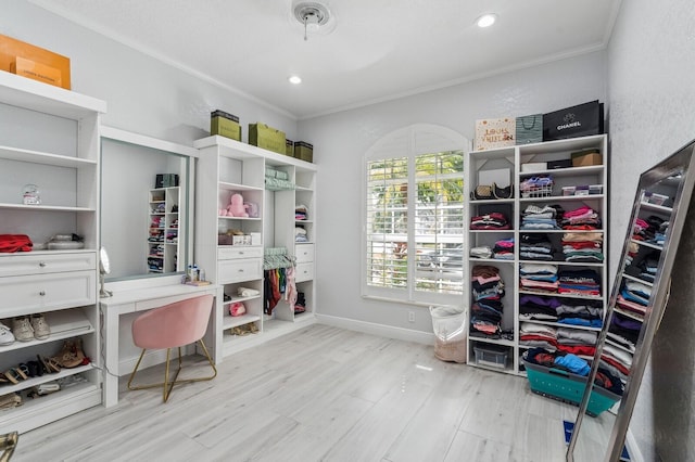 spacious closet with light hardwood / wood-style floors