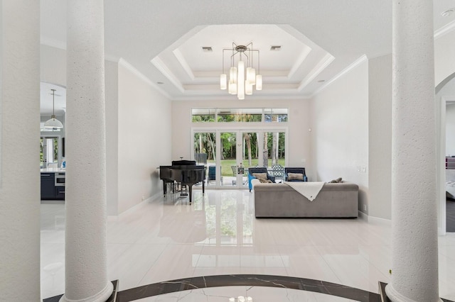 living room featuring a raised ceiling, french doors, crown molding, and an inviting chandelier