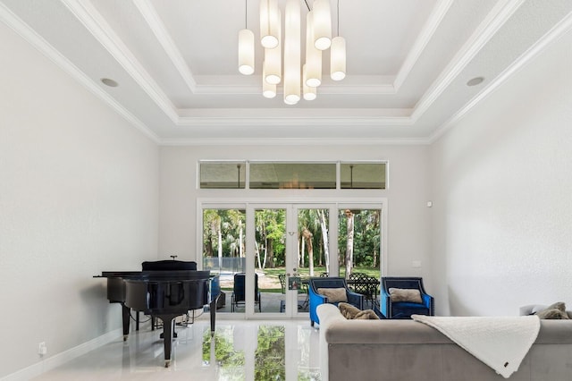 living room featuring a raised ceiling, french doors, and crown molding