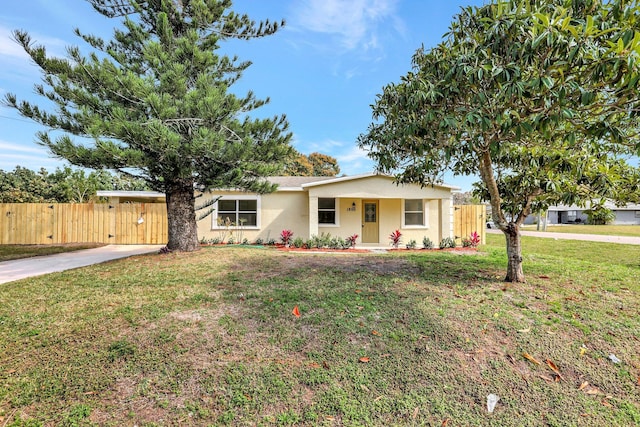 ranch-style house with a front yard