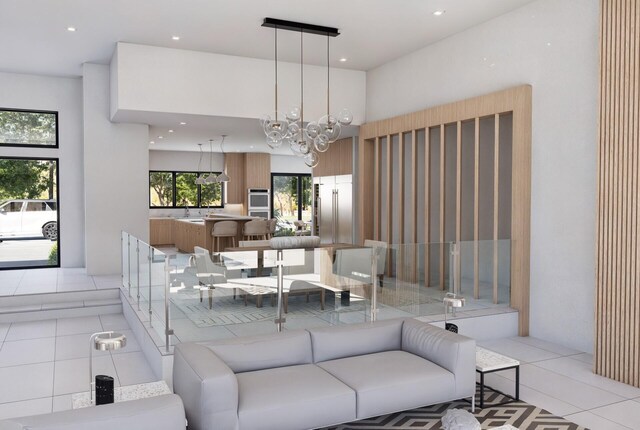 living room with an inviting chandelier, sink, and light tile patterned floors