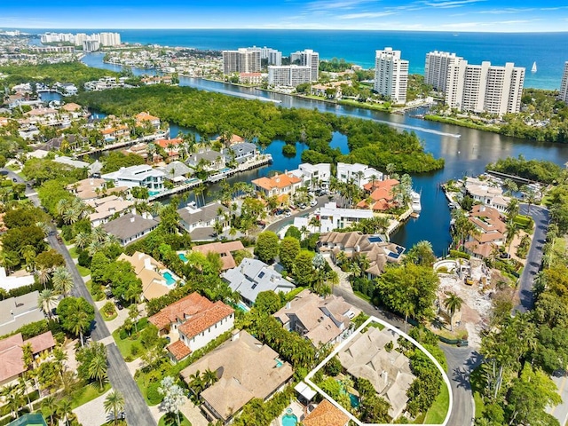 birds eye view of property featuring a water view